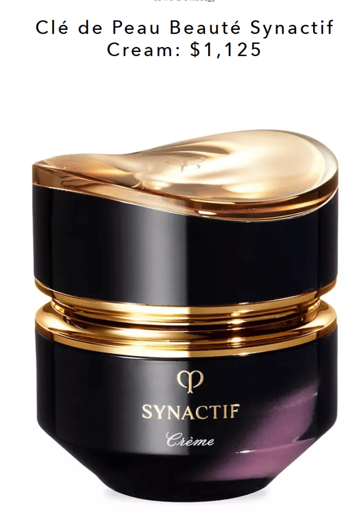 קופסה של קרם Synactif של Clé de Peau Beauté במחיר של 1,125 דולר, עם עיצוב יוקרתי ושילוב של צבעים שחור וזהב.